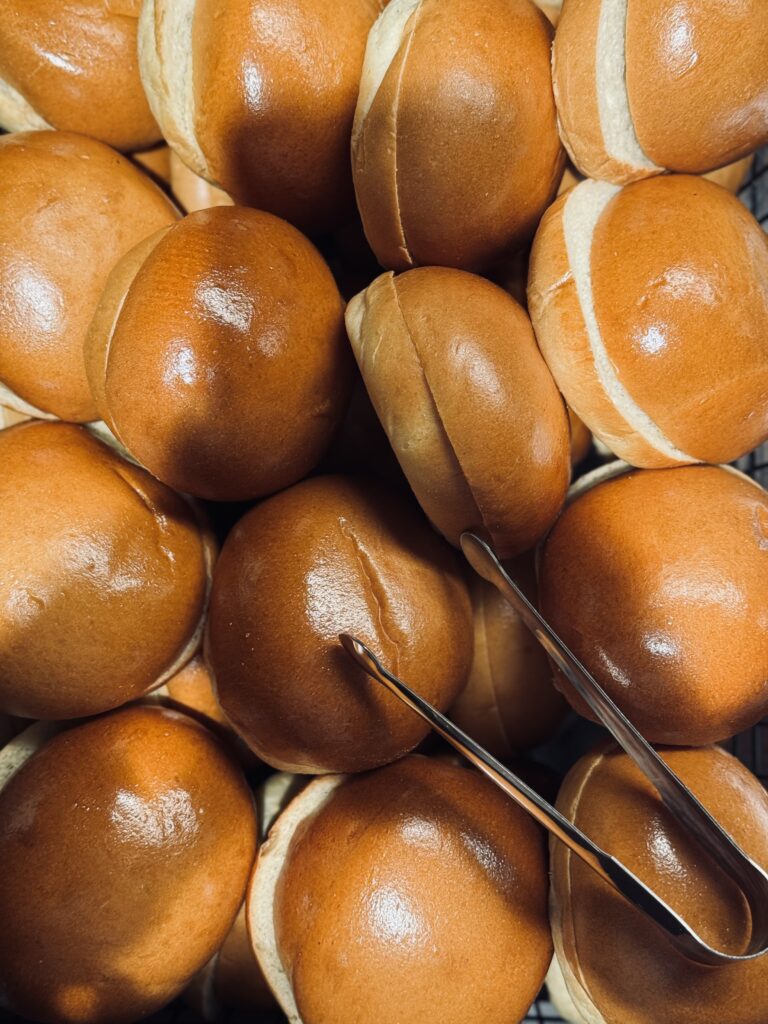 Sliced buger buns stacked onto each other